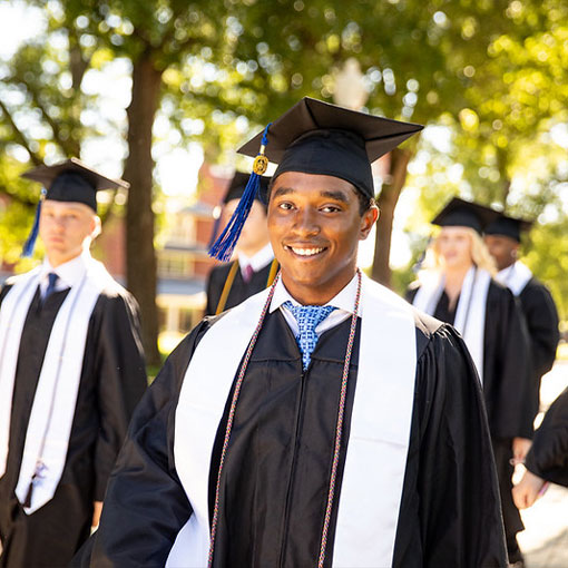 A student smiling. Links to Gifts by Will gifts_will.jpg